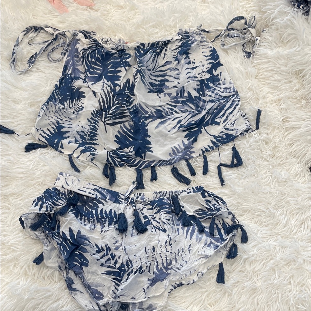 Vintage Havana printed two piece set.  Strapless design and tassel accents.